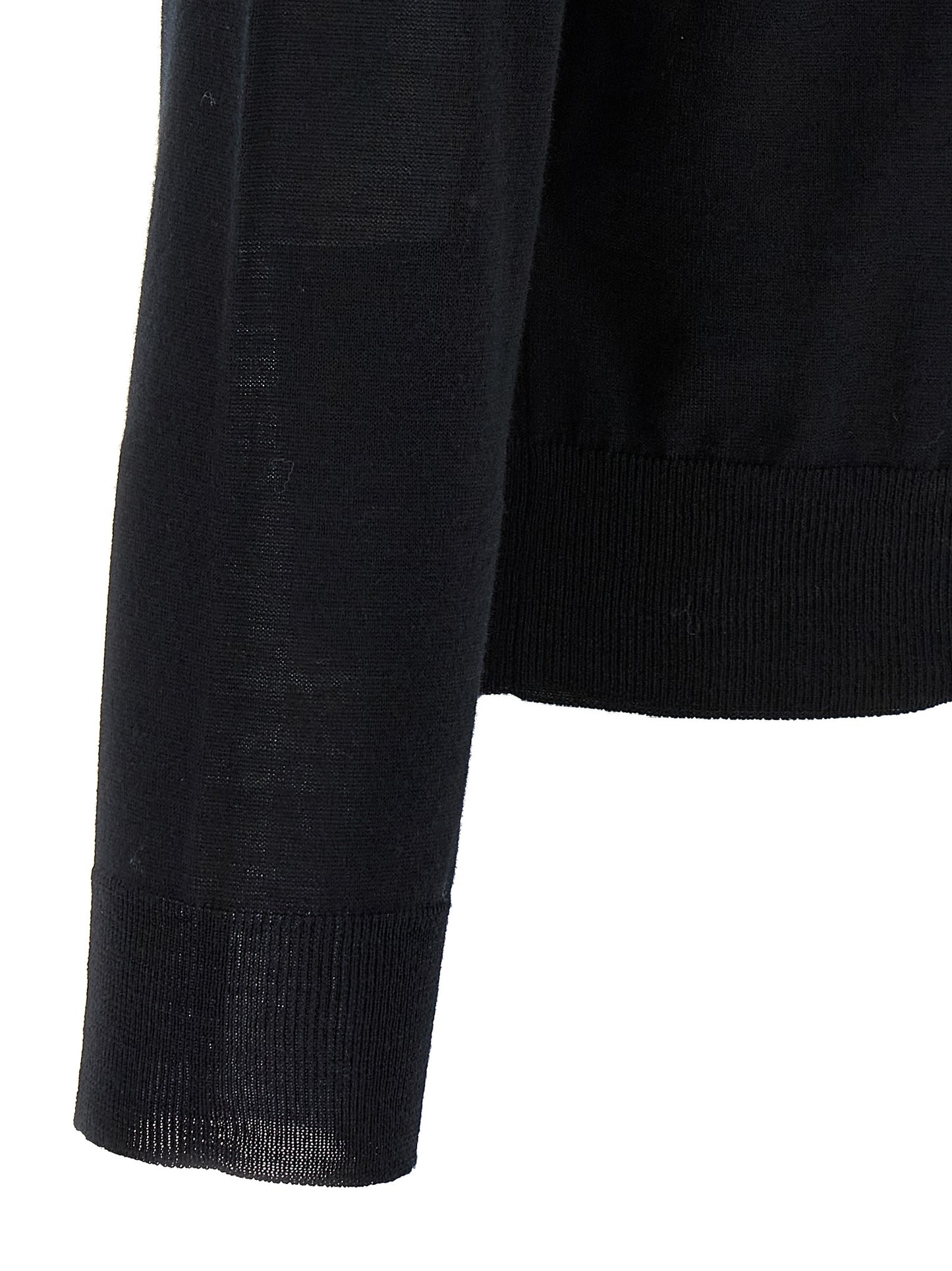 Cardigan by Valentino Garavani for men in virgin wool black showcases a captivating silhouette, artfully detailed with a captivating and for a truly sophisticated captivating look.