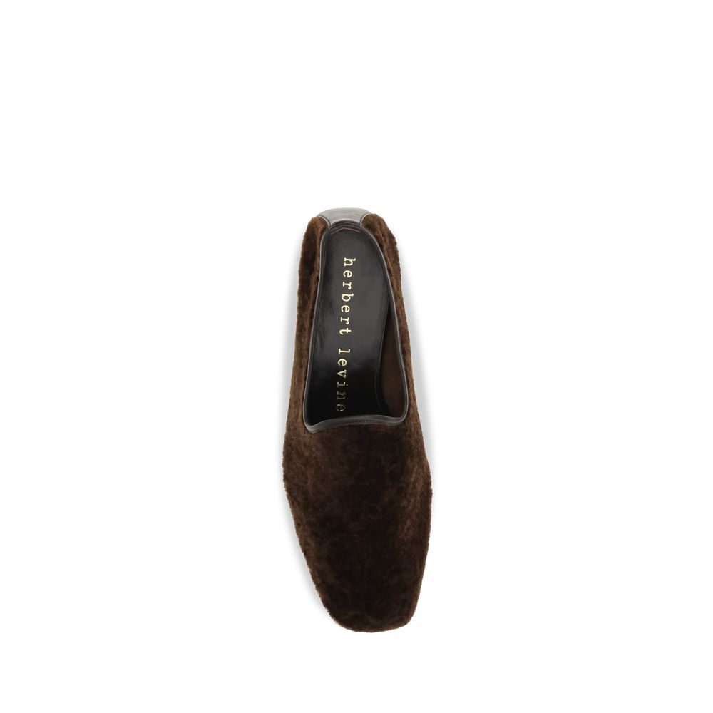 Flat Loafer Slip-On Shoes by Herbert Levine for women in bos taurus calf suede leather brown showcases a timeless silhouette from the Women's Bos Taurus Calf Suede Leather Flat Loafer Slip-On Shoes collection, featuring a timeless flat and square toe style for a timeless finish.