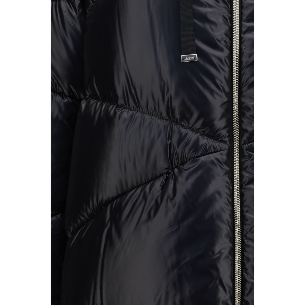 Puffer Jacket by Herno for women in polyamide & fur black features a dramatic silhouette, showcasing a sophisticated hooded high-collar neckline and distinctive lightweight, hooded & insulated for a dramatic aesthetic.