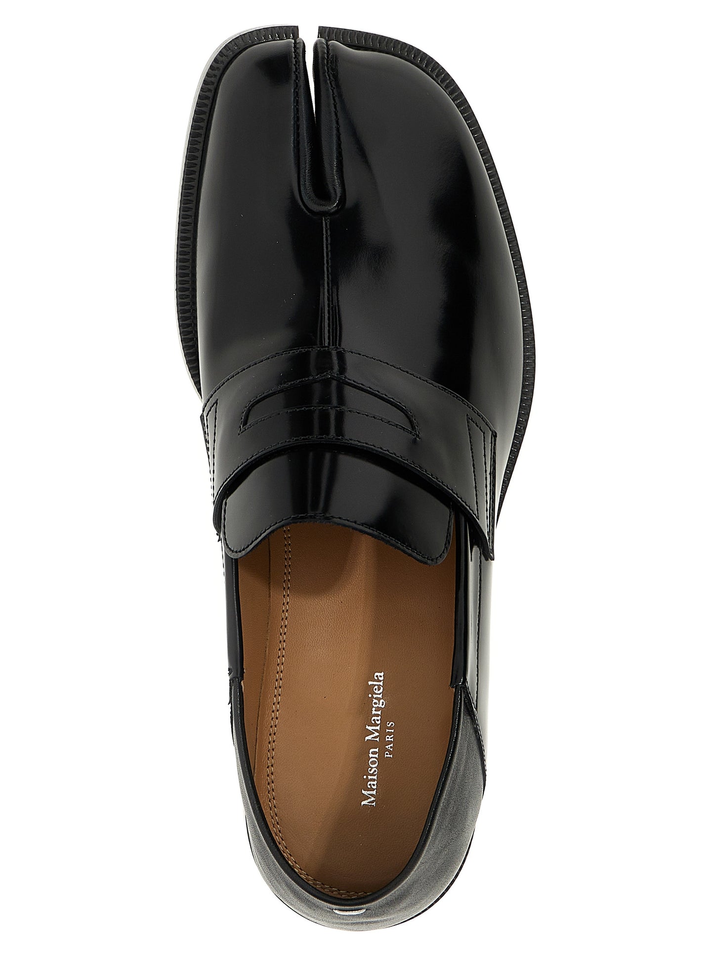 Loafer Slip-On Shoes by Maison Margiela for men in calfskin leather black & signature showcases a timeless silhouette from the Men's Calfskin Leather Loafer Slip-On Shoes collection, featuring a timeless and for a timeless finish.