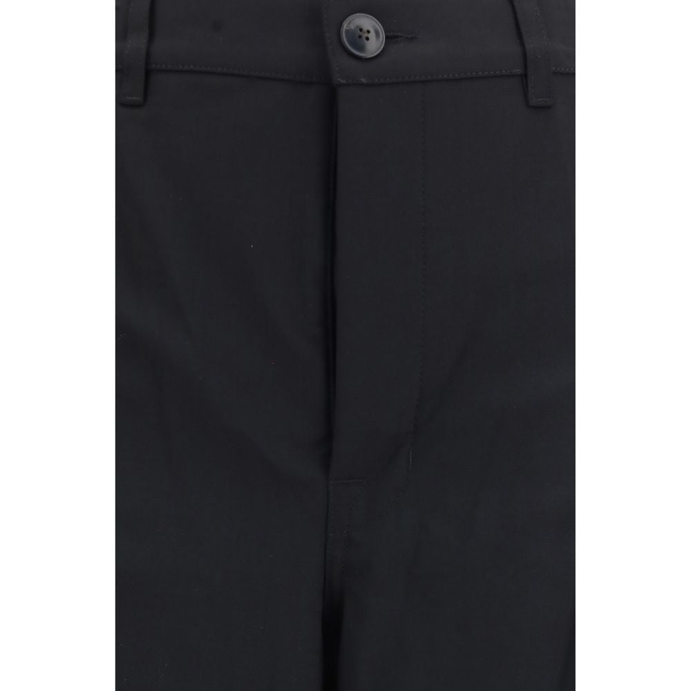 Trousers by Rick Owens for women in wool black presents a perennial silhouette, meticulously tailored with a regular-fit & wide cut, long finish, and an elegant .