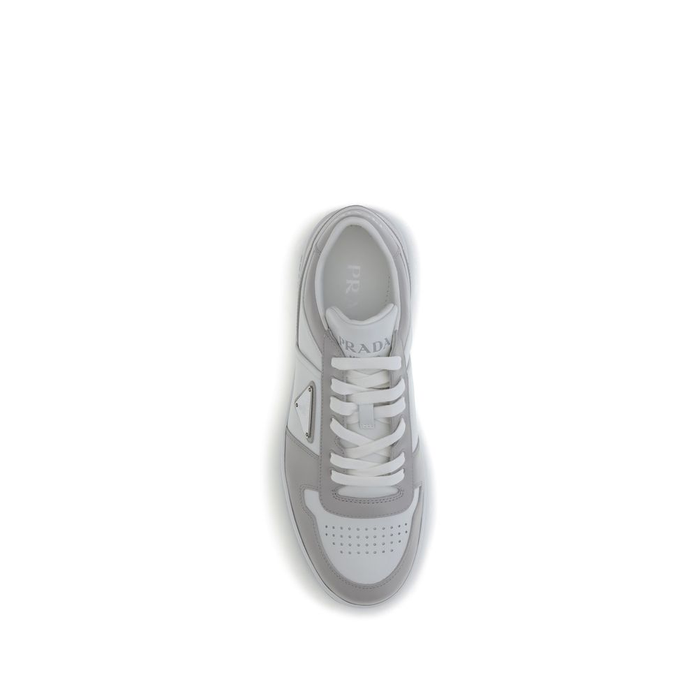 Sneakers by Prada for men in bos taurus calf leather multicolor presents a sumptuous silhouette, artfully capturing the essence of the Men's Low Top Bos Taurus Calf Leather Sneakers with its sumptuous low-top style design.