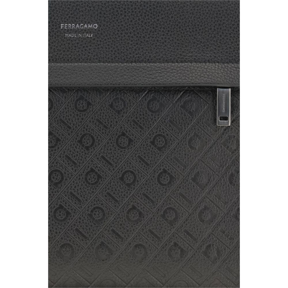 Pouch Handbag by Ferragamo for unisex in bos taurus calfskin leather black & monogram features an refined silhouette, showcasing a secure zipper, ample , and versatile wristlet for a sophisticated refined aesthetic.