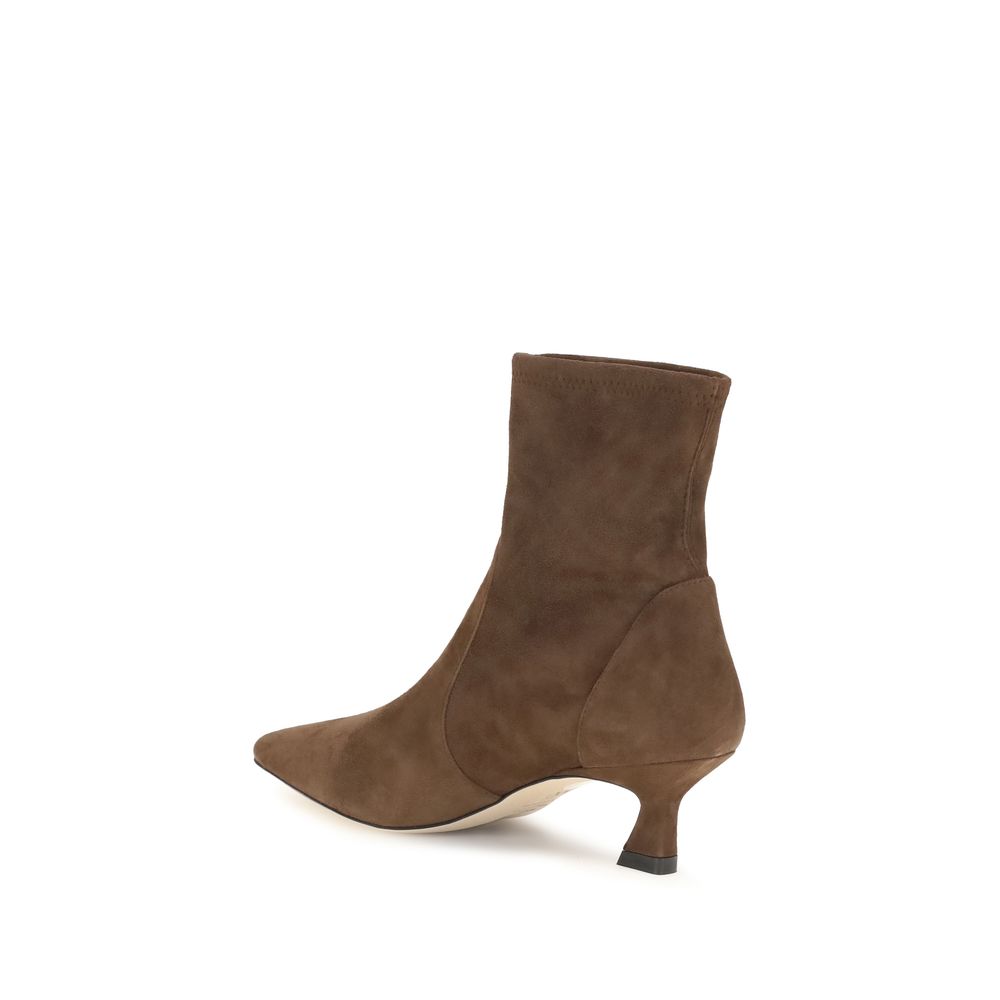 Mid-Heel Sock Ankle Boots by Stuart Weitzman for women in bos taurus calf leather brown showcases a impeccable silhouette as Women's Bos Taurus Calf Leather Mid-Heel Sock Ankle Boots, artfully defined by a impeccable mid-heel and a impeccable pointed toe style.