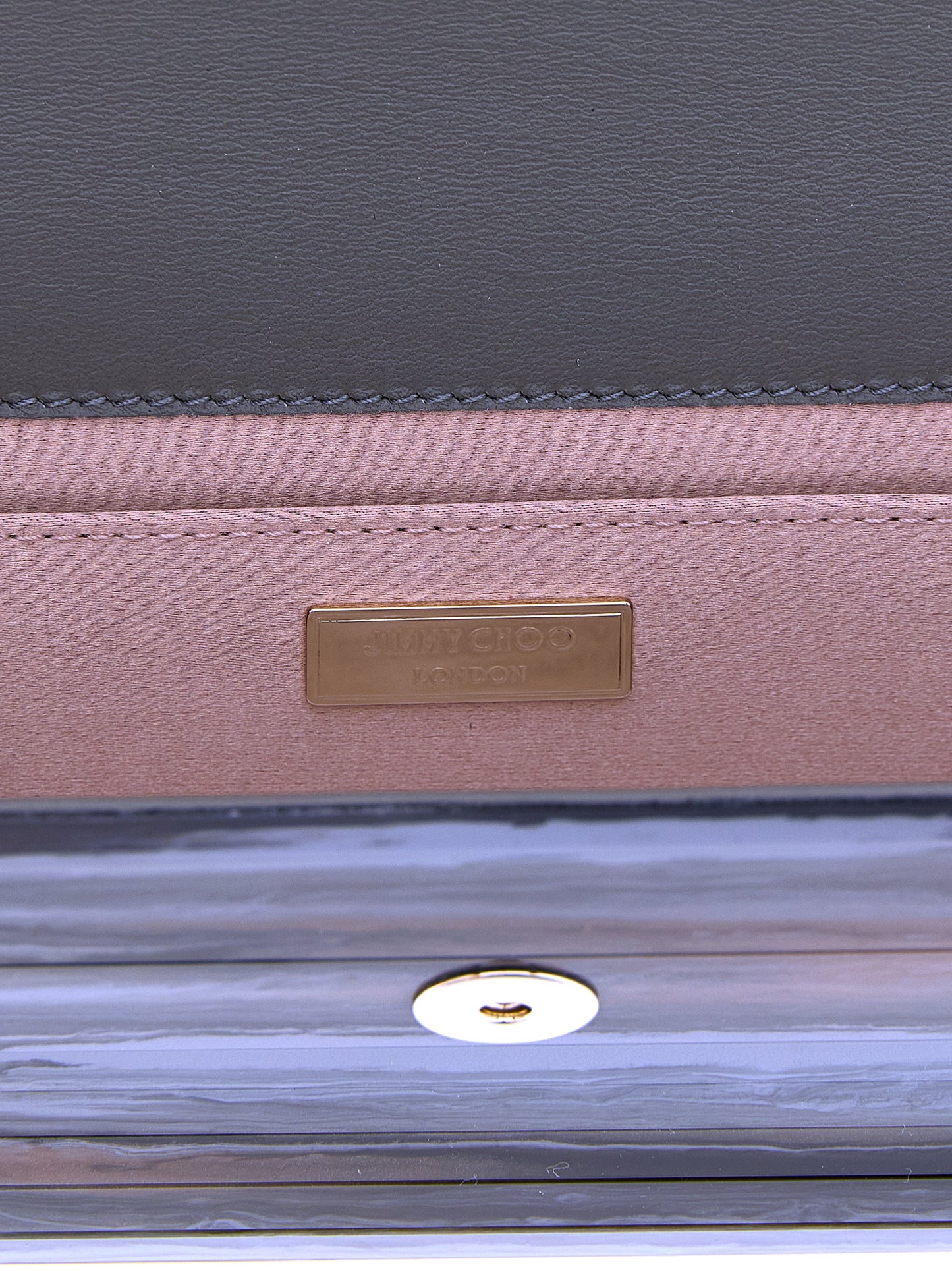 Evening Flap Clutch Handbag by Jimmy Choo for women in lambskin leather & marble gray & gold features a sculptural silhouette with a secure flap & magnetic, ample , and versatile for a sculptural finish.