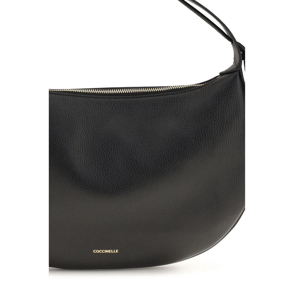 Shoulder Bag by Coccinelle for women in bos taurus grained calf leather black, gold & signature features a effortless sophistication silhouette, secured by a zipper with ample and versatile shoulder-strap for a effortless sophistication finish.