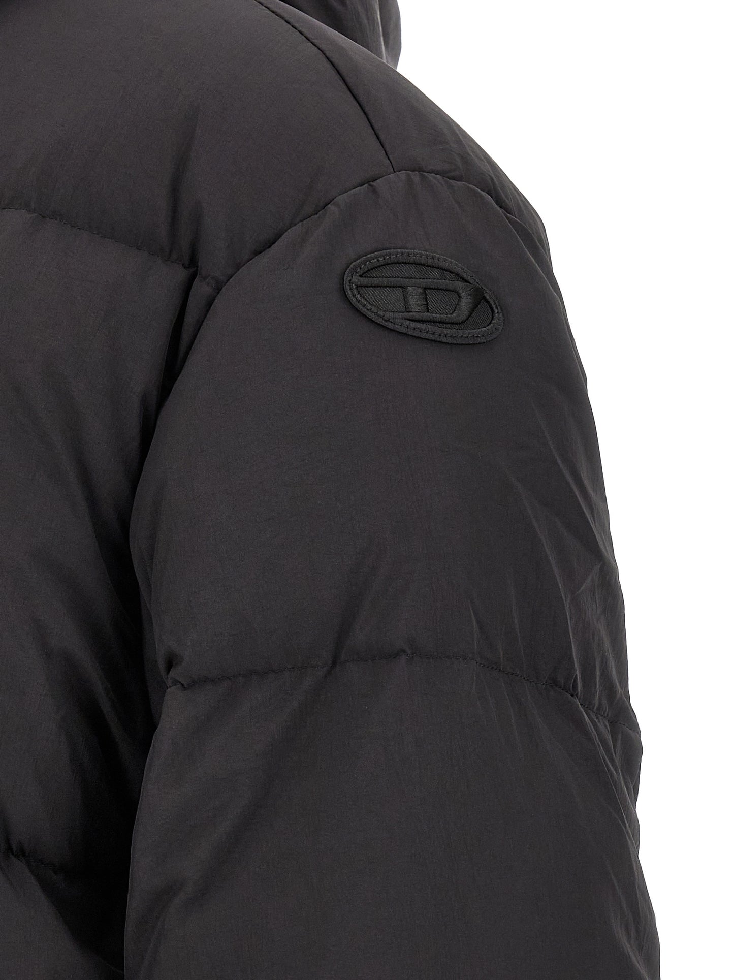 Hooded Puffer Jacket by Diesel for men in polyamide black presents a effortlessly chic silhouette, showcasing a sophisticated and premium hooded & insulated for a truly effortlessly chic finish.