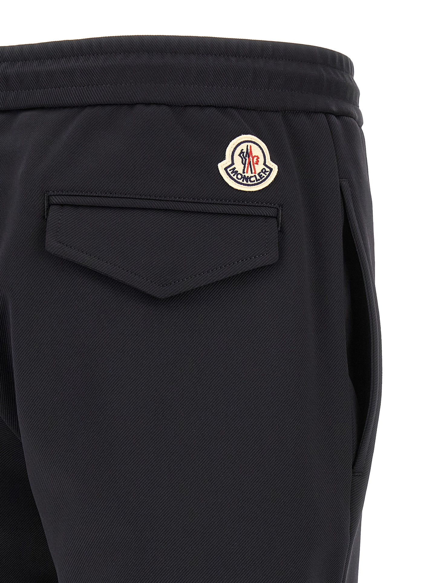Joggers by Moncler for men in polyamide felt black features an sophisticated and tapered-leg with a precise long, creating a sophisticated and sophisticated silhouette.