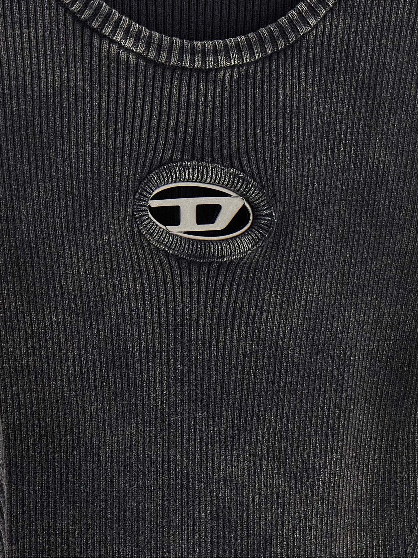 Dress by Diesel for women in cotton black features an magnificent silhouette, artfully detailed with a magnificent and that flows into an magnificent short mini.