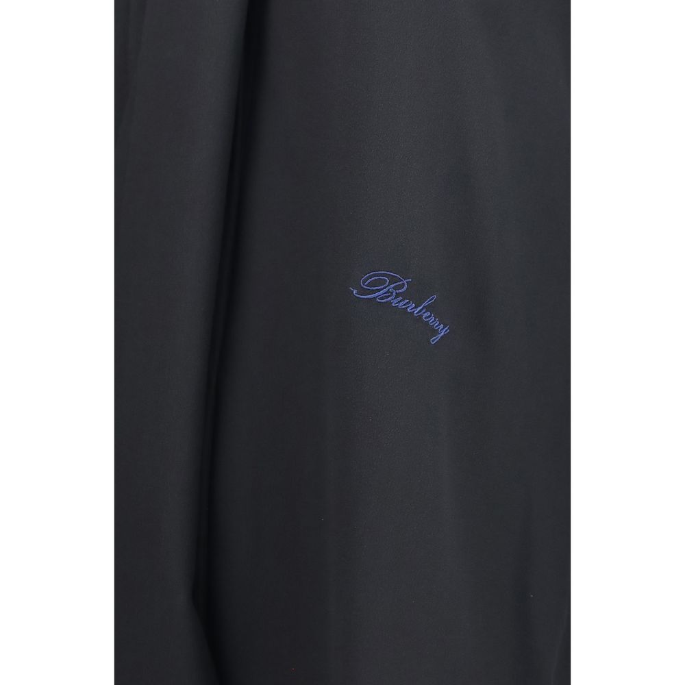 Blouse by Burberry for women in silk black, pearl & signature presents a discerning silhouette, showcasing a sophisticated and for a truly discerning finish.