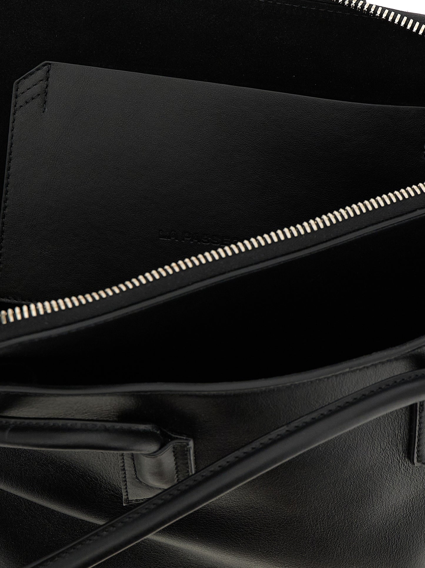 Medium Shoulder Bag by The Attico for women in calfskin leather black features a enviable silhouette, showcasing a secure zipper, ample external-pockets, and enviable shoulder-strap & handle for a enviable finish.