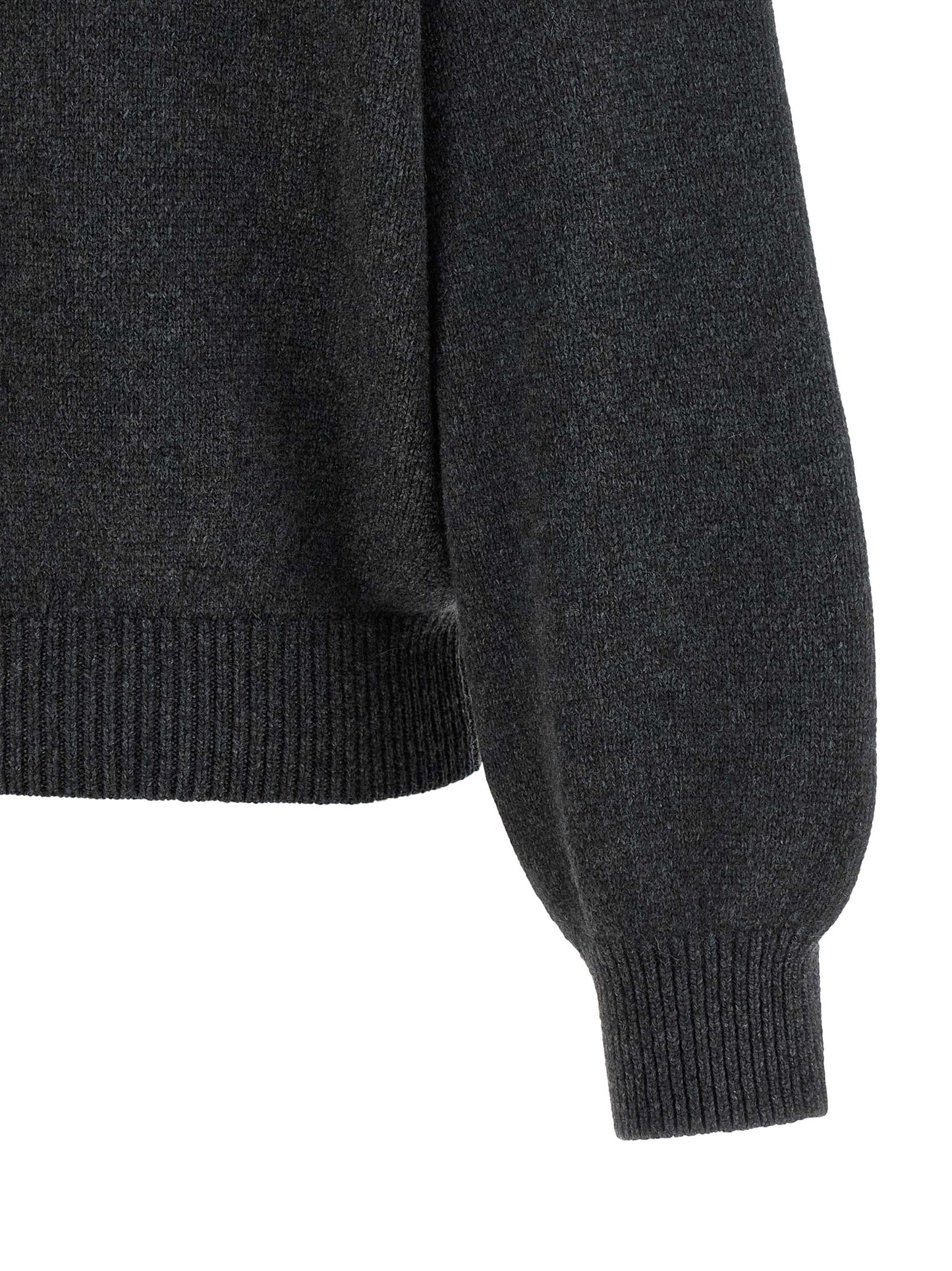 Cardigan by Khaite for women in cashmere gray showcases a luxurious silhouette, meticulously detailed with a sophisticated and for a refined finish.