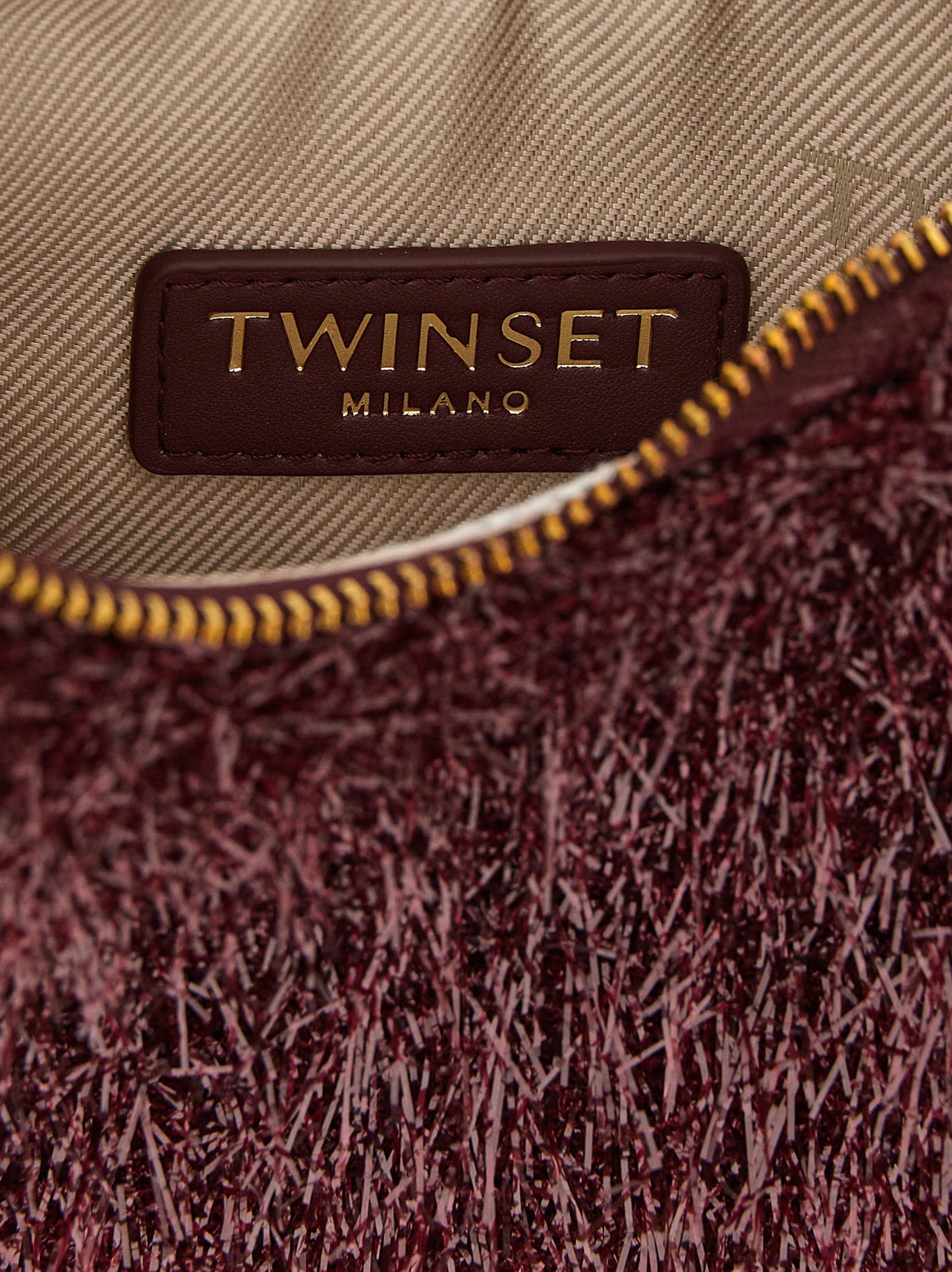 Mini Evening Crescent Handbag by Twinset for women in leather bordeaux & gold features an refined silhouette, showcasing a secure zipper, ample , and versatile shoulder-strap, detachable-strap & handle for a sophisticated refined aesthetic.