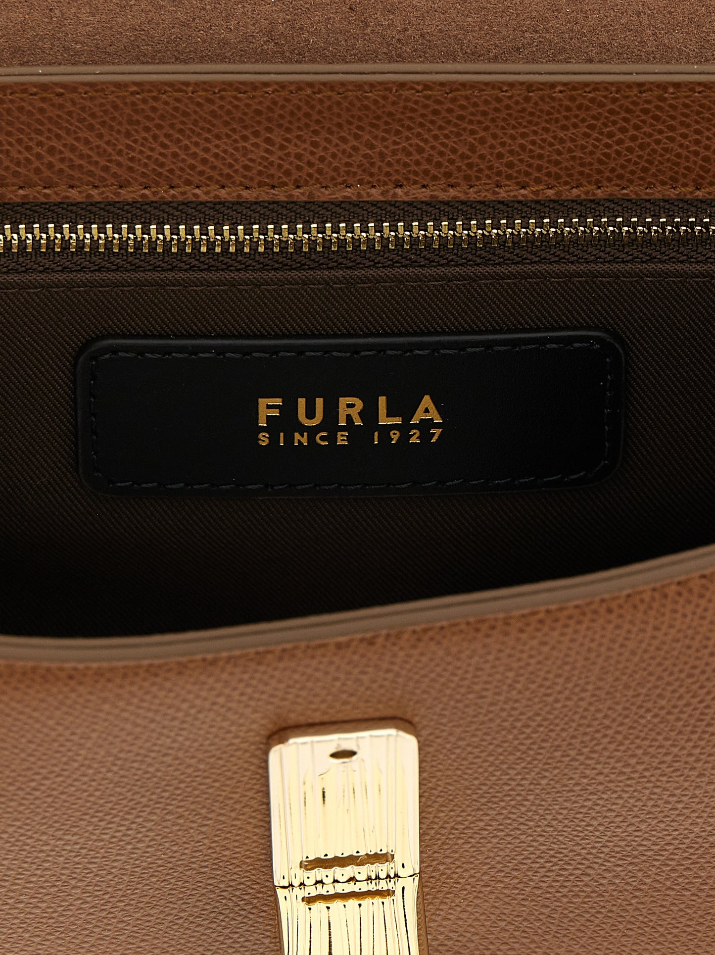 Crossbody Pouch Handbag by Furla for women in bos taurus calfskin leather brown & gold features a transformative sophistication silhouette, showcasing a secure flap, ample , and versatile crossbody-strap & adjustable-strap for a transformative sophistication look.