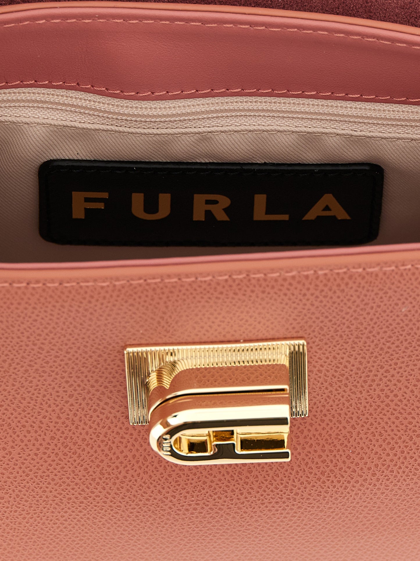 Mini Handbag by Furla for women in calfskin leather gold, multicolor, pink & signature features a refined silhouette, showcasing a secure , organized , and versatile handle & adjustable-strap for a refined finish.