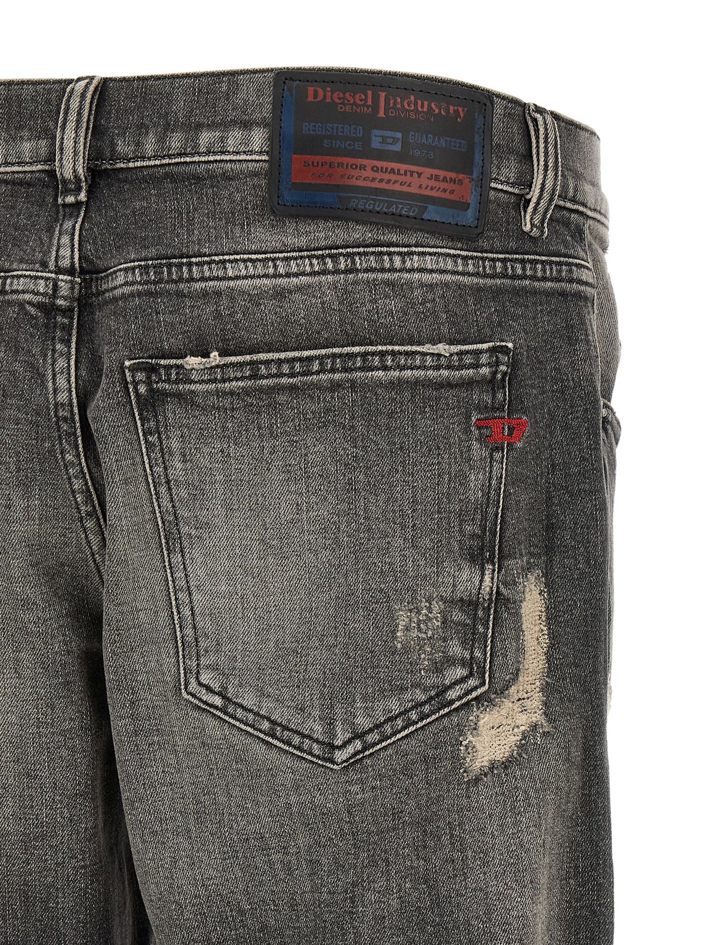 Jeans by Diesel for men in stretch denim cotton gray & red features a polished silhouette with a polished skinny, reaching a polished long and finished with a polished mid rise.