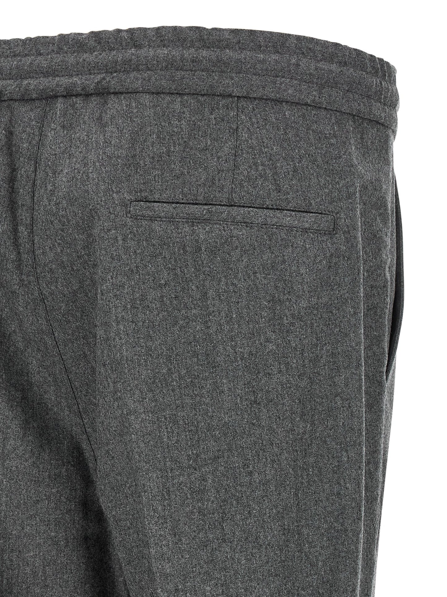Trousers by Brunello Cucinelli for men in virgin wool & flannel gray features a sculptural silhouette, showcasing a sculptural relaxed-fit and long with a sophisticated for a sculptural finish.