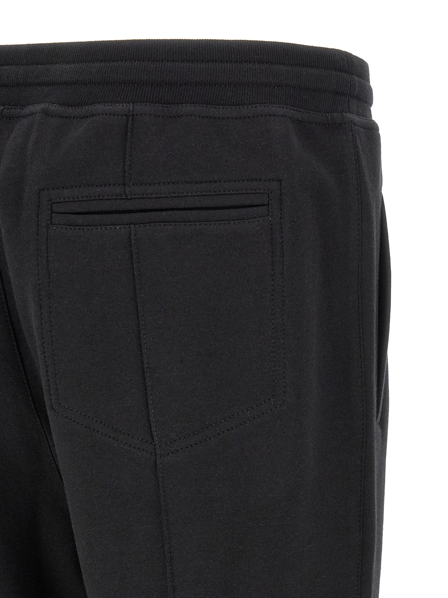 Joggers by Brunello Cucinelli for men in cashmere & silk black & silver presents a tailored silhouette, showcasing a tailored tapered-leg and long cut with a refined for a truly tailored aesthetic.