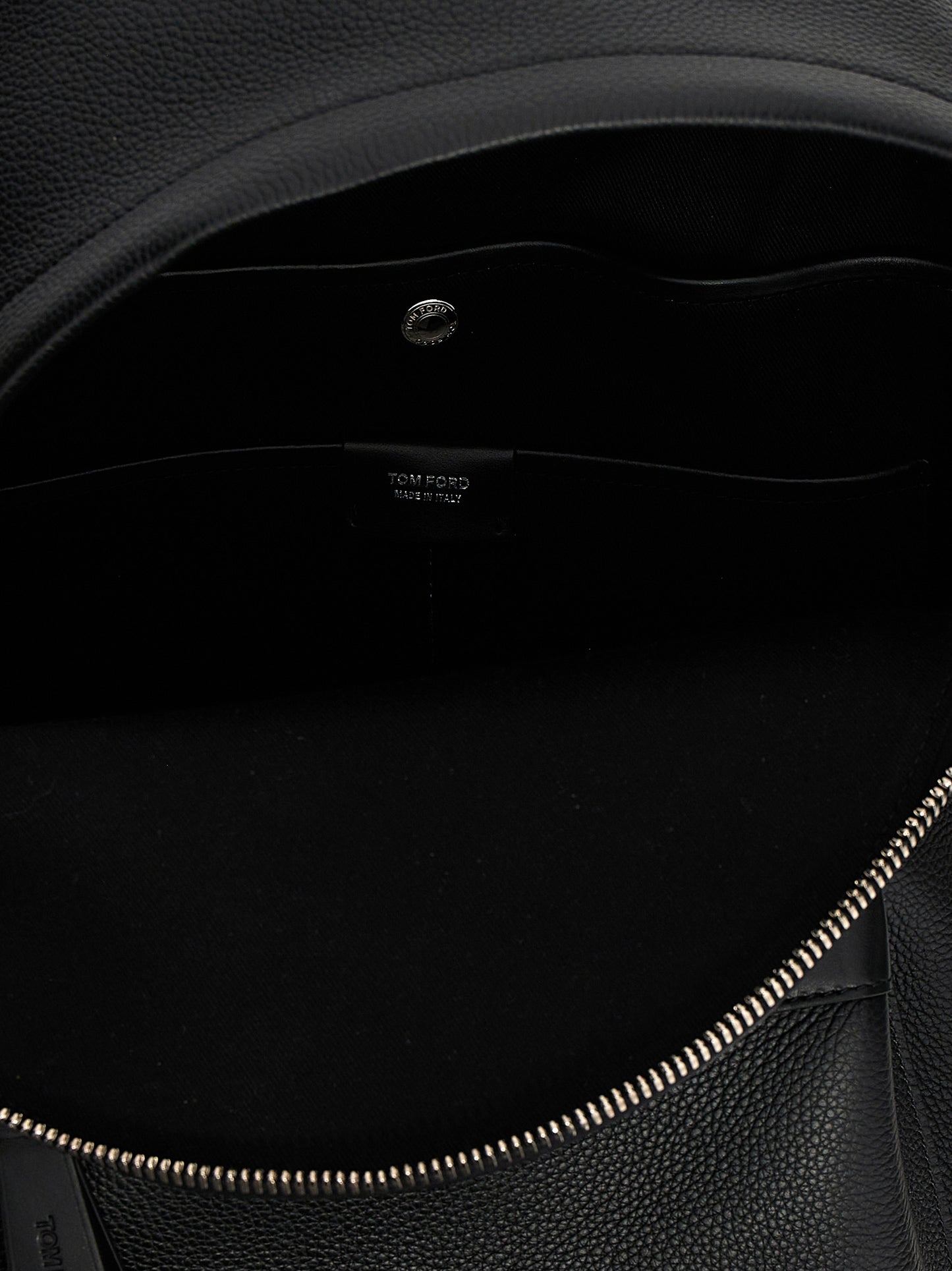 Backpack by Tom Ford for men in calfskin leather black features a refined silhouette, showcasing the Buckley Essence Calfskin Leather Backpack design with a secure zipper, ample , and versatile backpack-strap, adjustable-strap & handle.