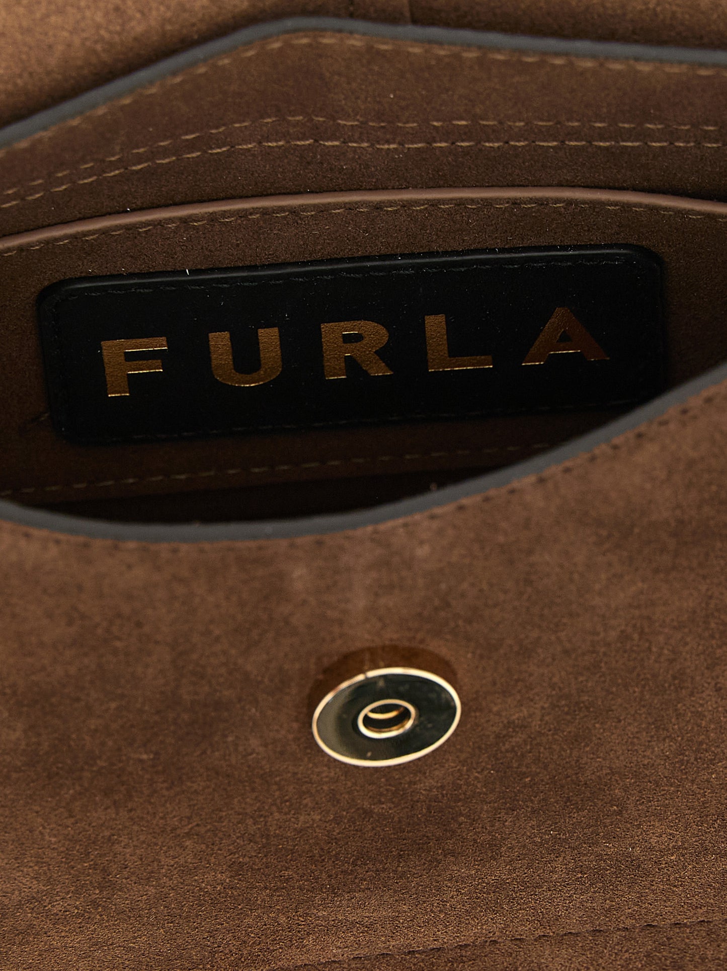 Mini Handbag by Furla for women in calfskin leather brown & gold presents a ornamental silhouette, showcasing a secure magnetic & buckle, ample , and versatile shoulder-strap, handle & adjustable-strap for a ornamental finish.