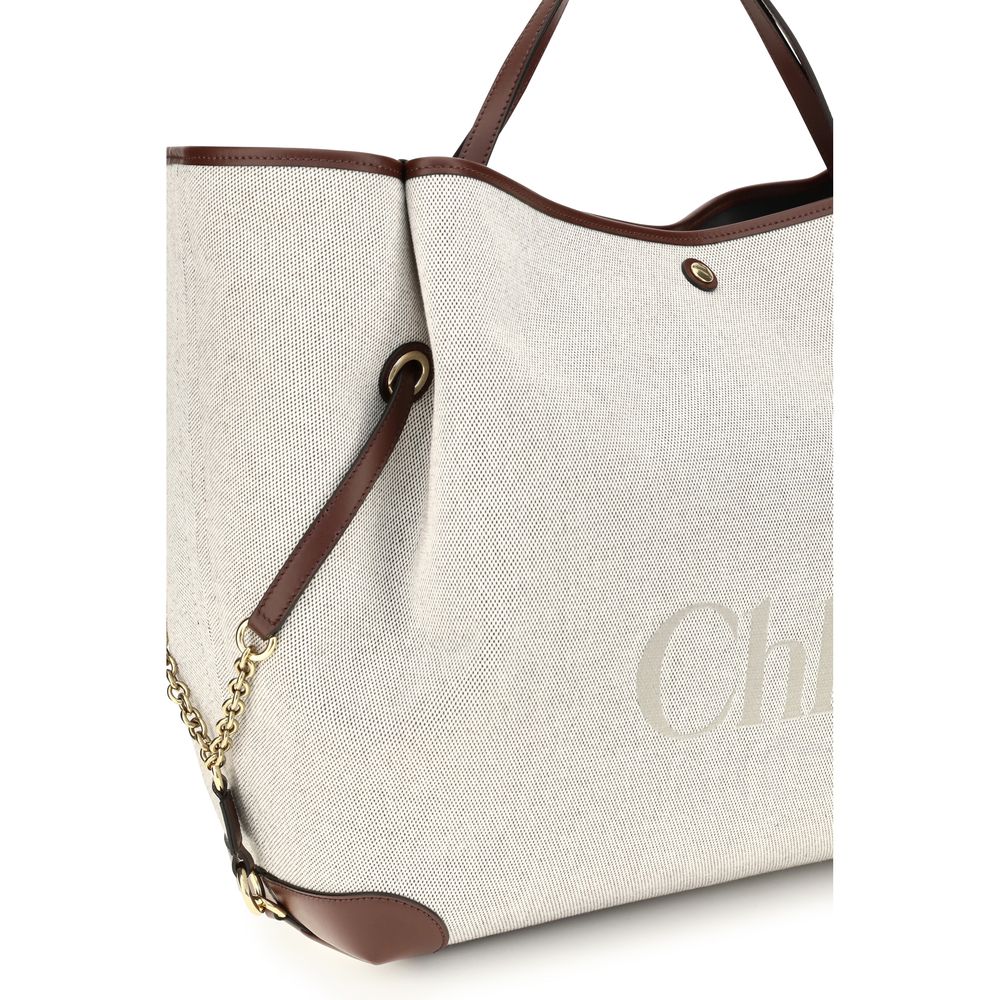 Large Shoulder Tote Bag by Chloé for women in cotton canvas beige & jacquard showcases a enviable silhouette, artfully detailed with a secure , organized , and versatile handle for a enviable look.