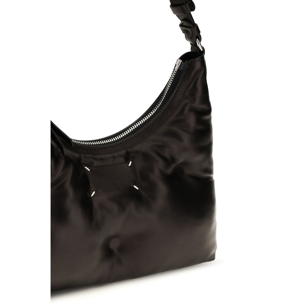 Small Quilted Shoulder Hobo Bag by Maison Margiela for women in lambskin leather black & signature features an effortlessly chic silhouette with a secure zipper, ample , and versatile shoulder-strap for effortlessly chic everyday luxury.