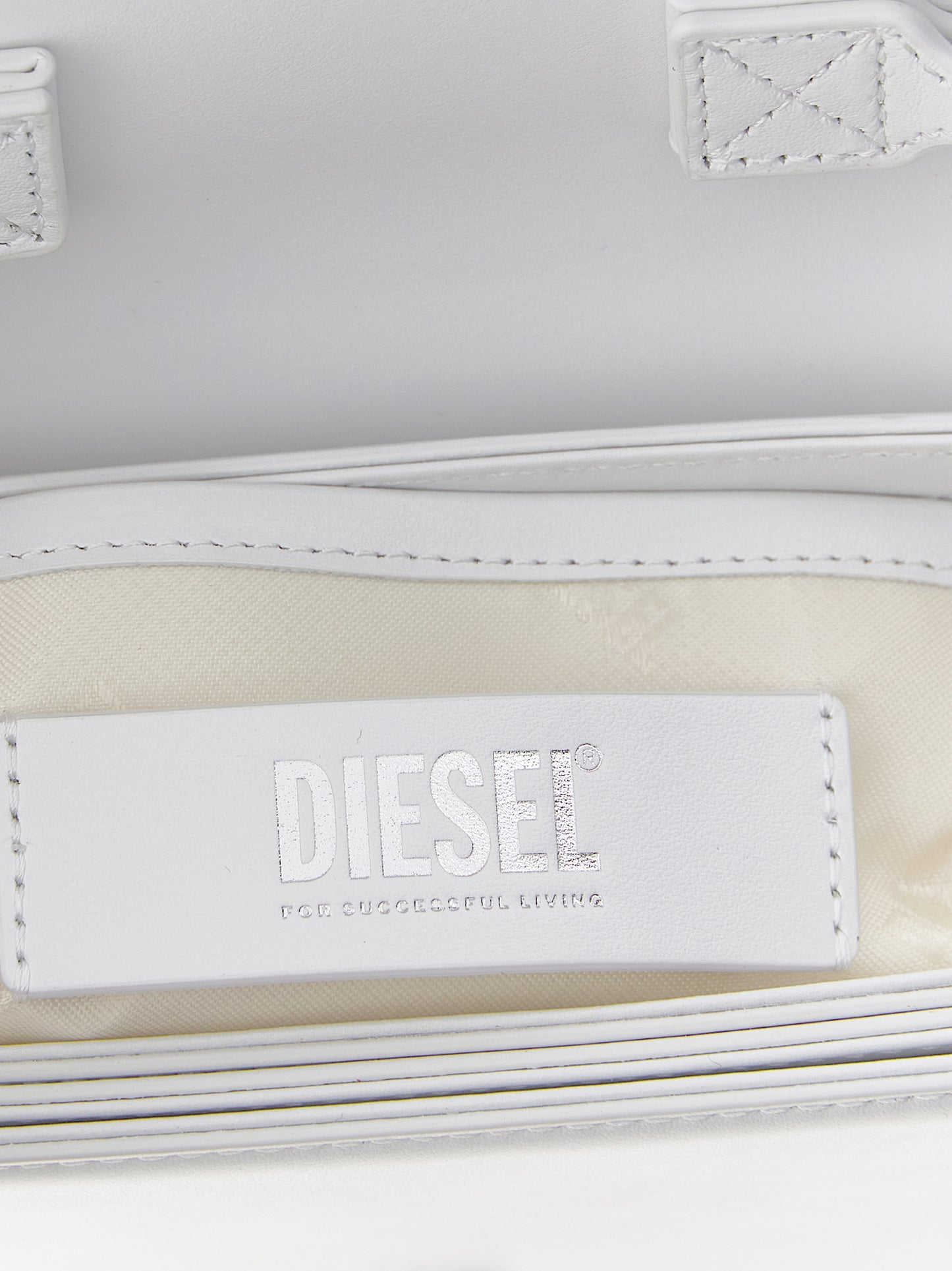 Shoulder Flap Bag by Diesel for women in leather white features a effortless sophistication silhouette, secured by a flap with ample and versatile shoulder-strap for a effortless sophistication finish.