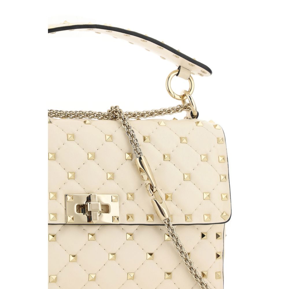 Crossbody Flap Clutch Handbag by Valentino Garavani for women in nappa lambskin leather beige & signature presents a ornamental silhouette, showcasing a secure flap, ample , and versatile crossbody-strap, handle, adjustable-strap & detachable-strap for a ornamental finish.