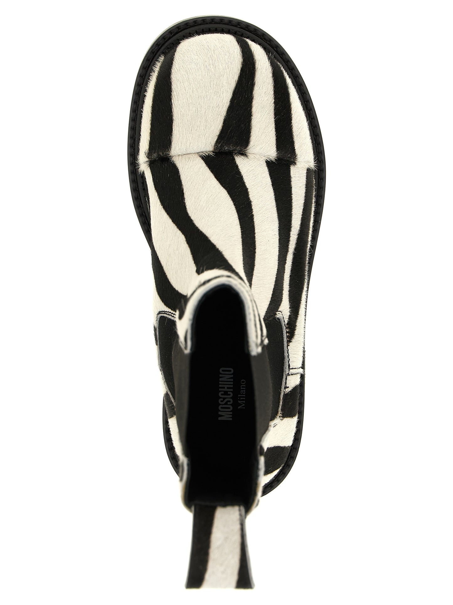 Flat Ankle Chelsea Boots by Moschino for women in calfskin leather bicolour, black, white, zebra & patterned features an enchanting design from the Women's Calfskin Leather Flat Ankle Chelsea Boots collection, highlighting a enchanting flat and for a refined look.