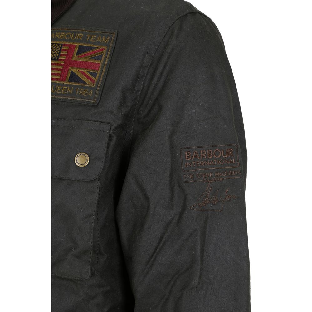 Jacket by Barbour International for men in cotton bicolour presents a impeccable silhouette, showcasing distinct pockets and a impeccable for a sophisticated finish.
