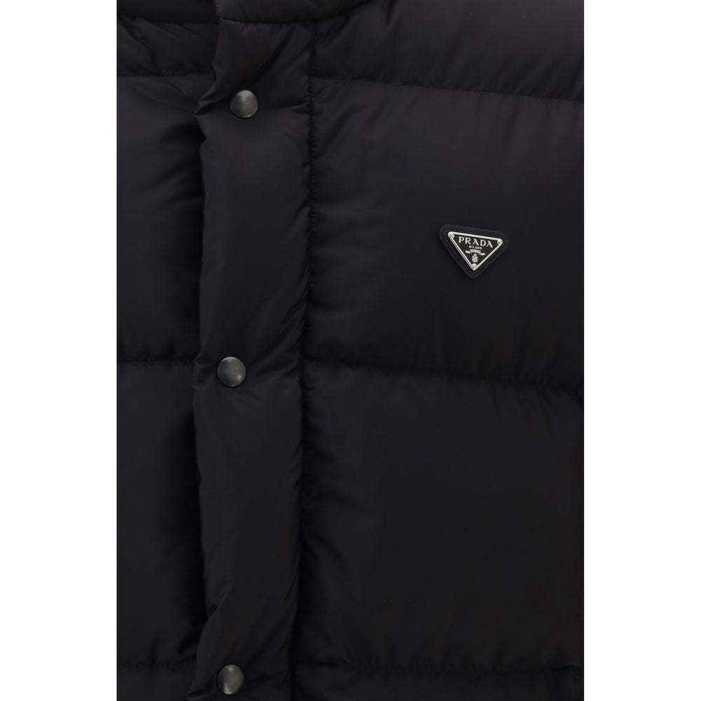 Puffer Jacket by Prada for men in nylon & goose down black showcases a bohemian silhouette, artfully detailed with a bohemian and signature pockets & insulated for a truly bohemian finish.
