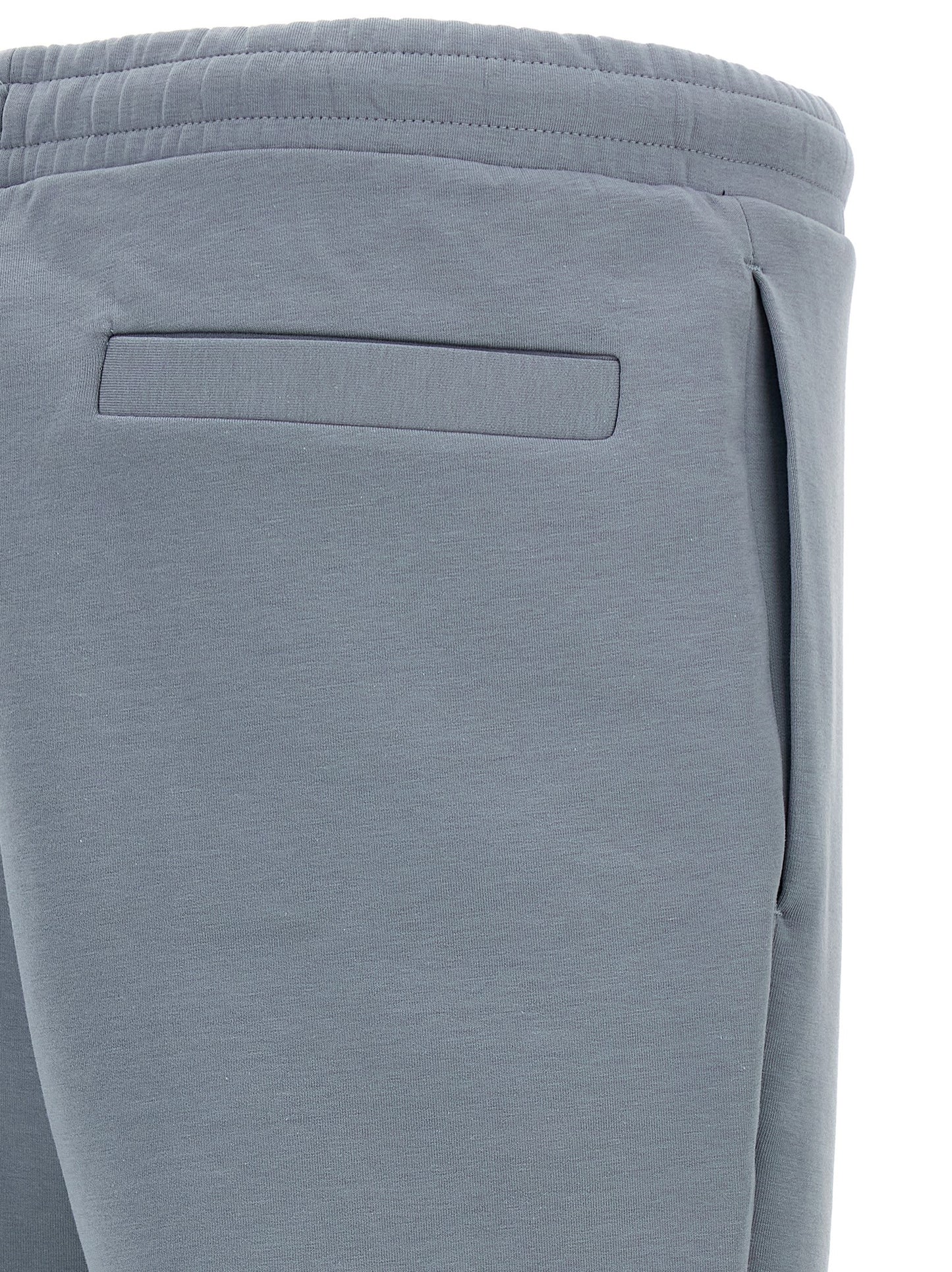 Joggers by Hugo Boss for men in stretch cotton gray presents a tailored silhouette, showcasing a tailored and long cut with a refined for a truly tailored aesthetic.