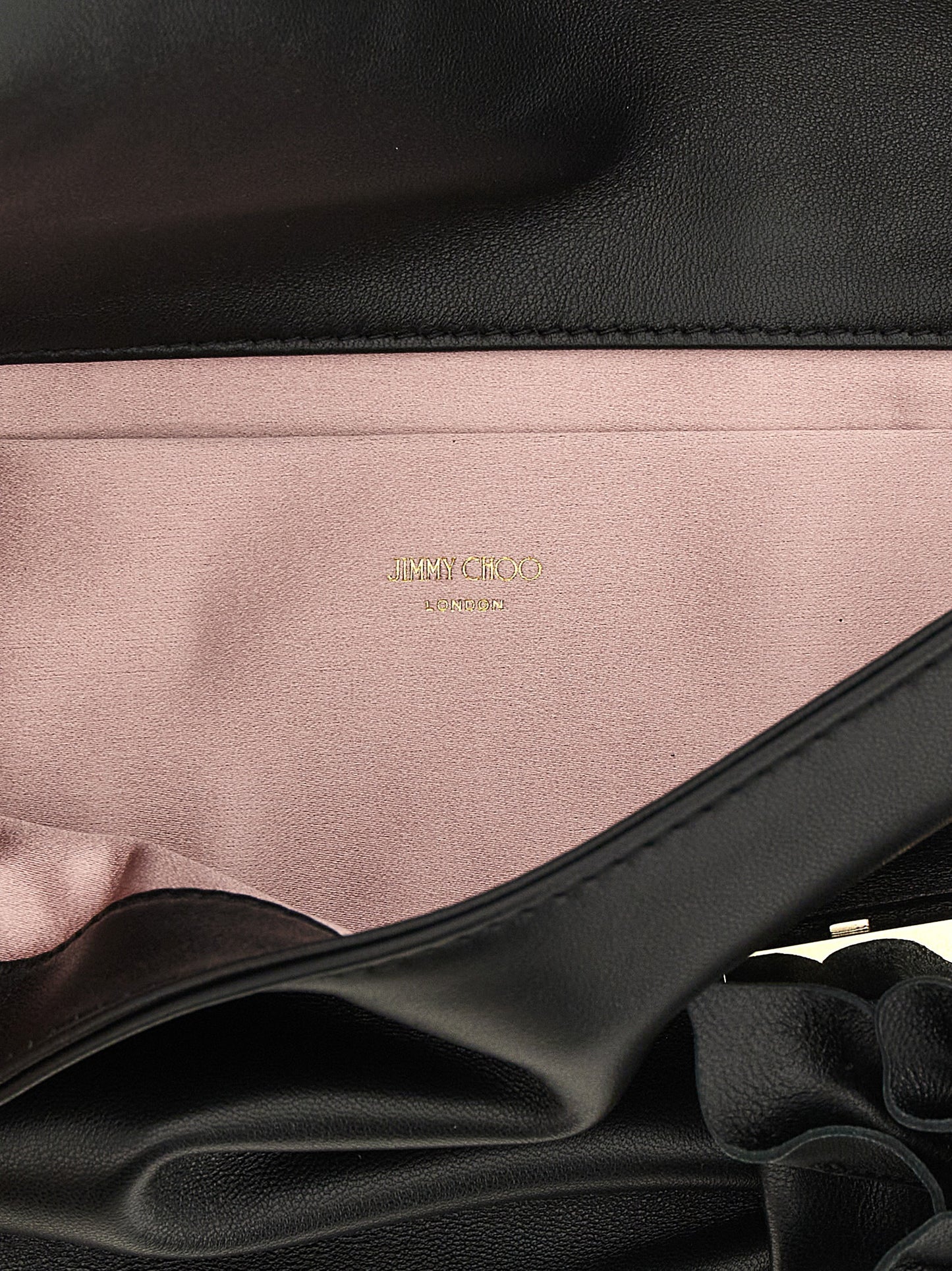 Evening Clutch Handbag by Jimmy Choo for women in lamb leather & satin black, gold, pink & floral features a sculptural silhouette with a secure , organized , and versatile for a sculptural finish.