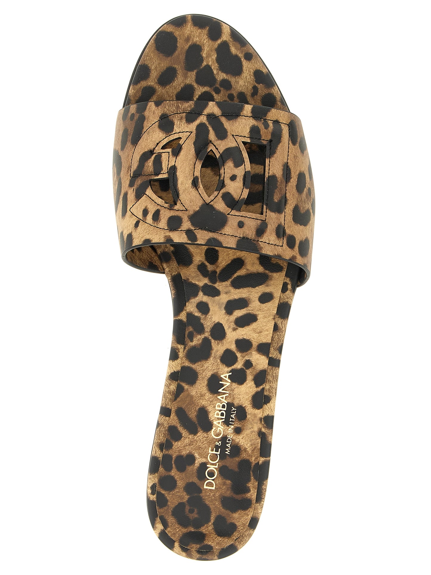Sliders Sandals Flat Shoes by Dolce & Gabbana for women in calfskin leather brown, leopard-print & print features an captivating silhouette, showcasing the captivating style of the Women's Calfskin Leather Sliders Sandals Flat Shoes with its distinct and refined .