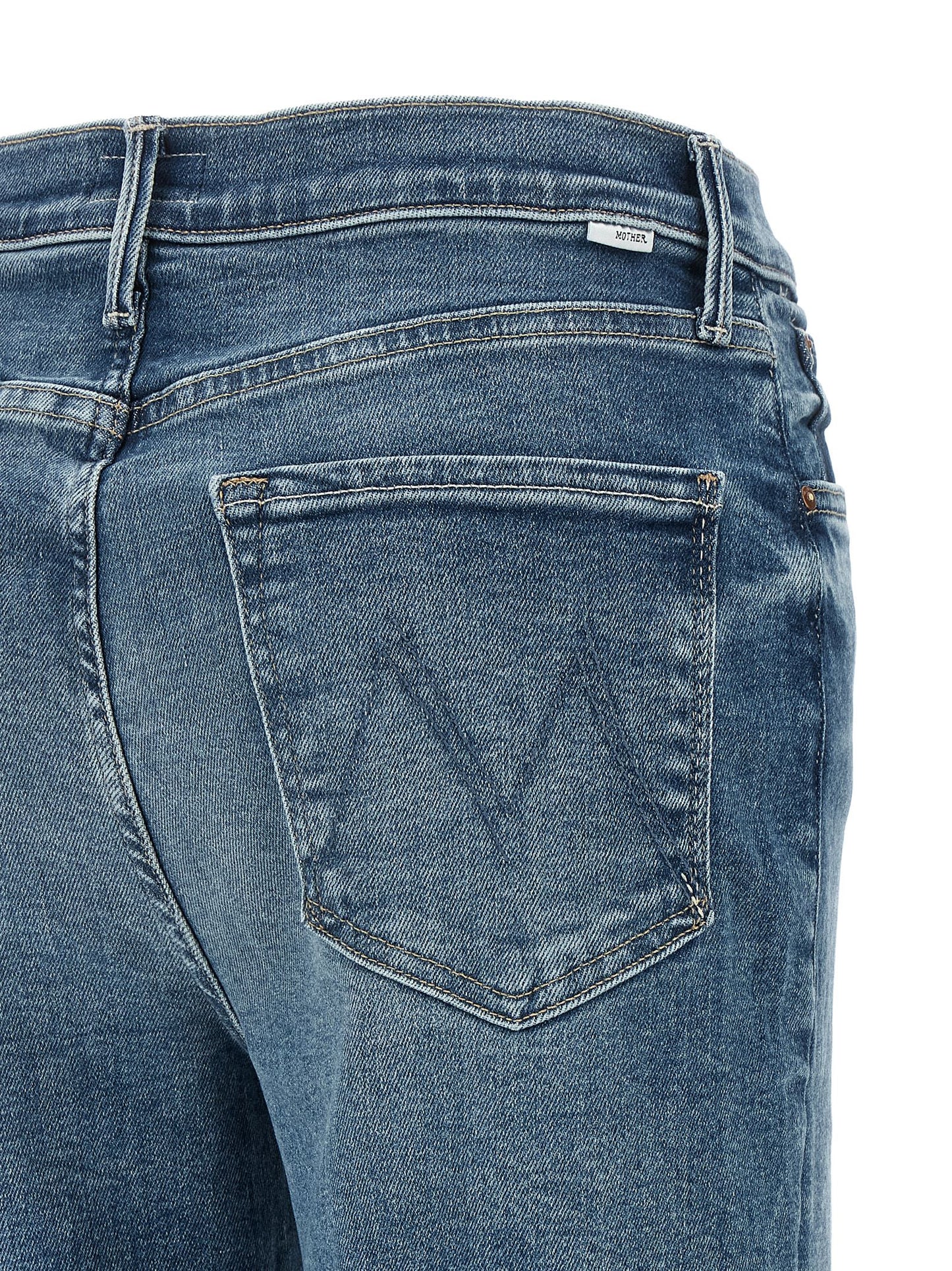 Jeans by Mother Denim for women in stretch denim cotton modal polyester blue & signature features a refined silhouette with a refined straight & flared, defined by a high rise and a refined long for a refined finish.