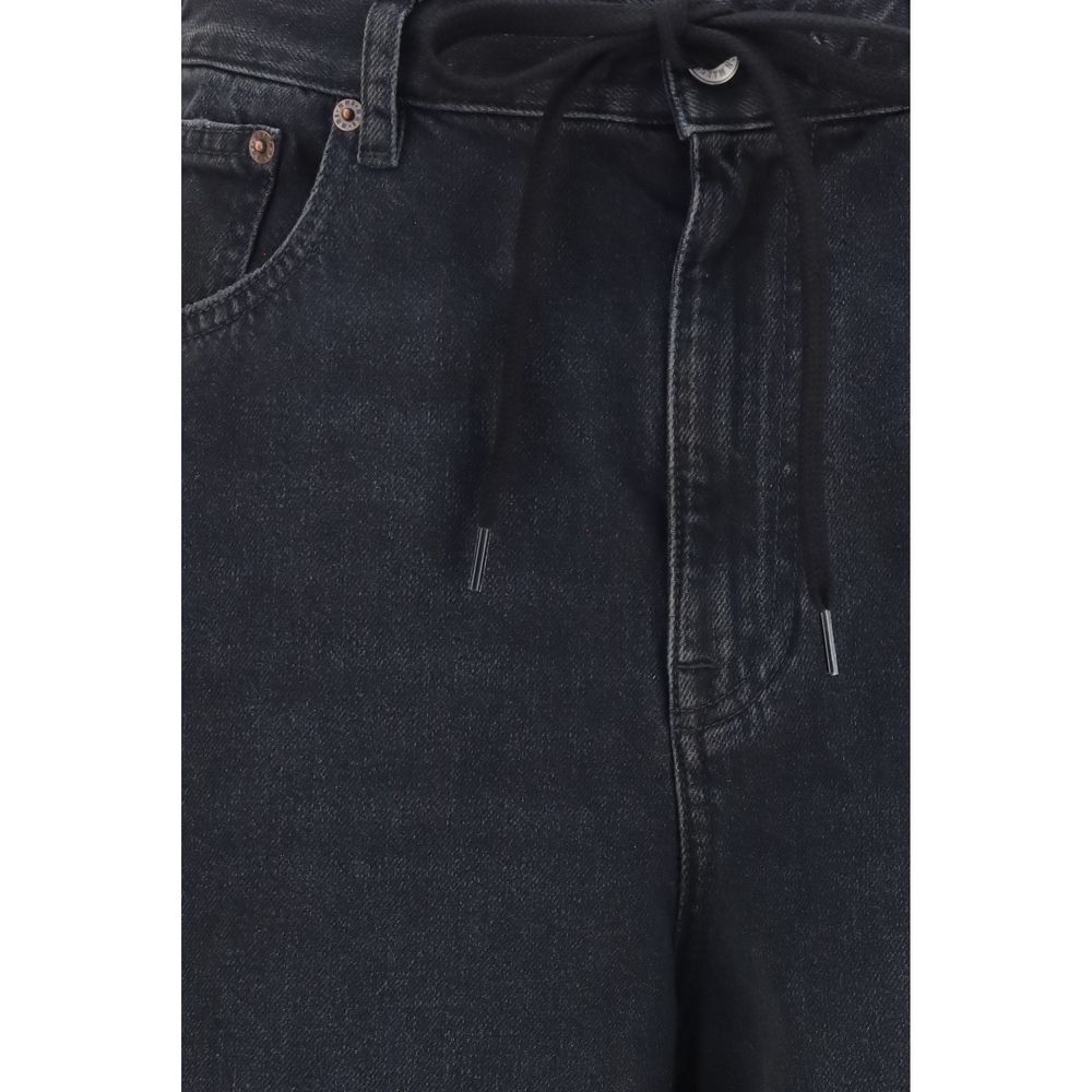 Jeans by MM6 for women in stretch denim cotton black presents a tailored silhouette, showcasing a tailored straight-leg, relaxed-fit & regular-fit and long cut with a refined low rise for a truly tailored aesthetic.