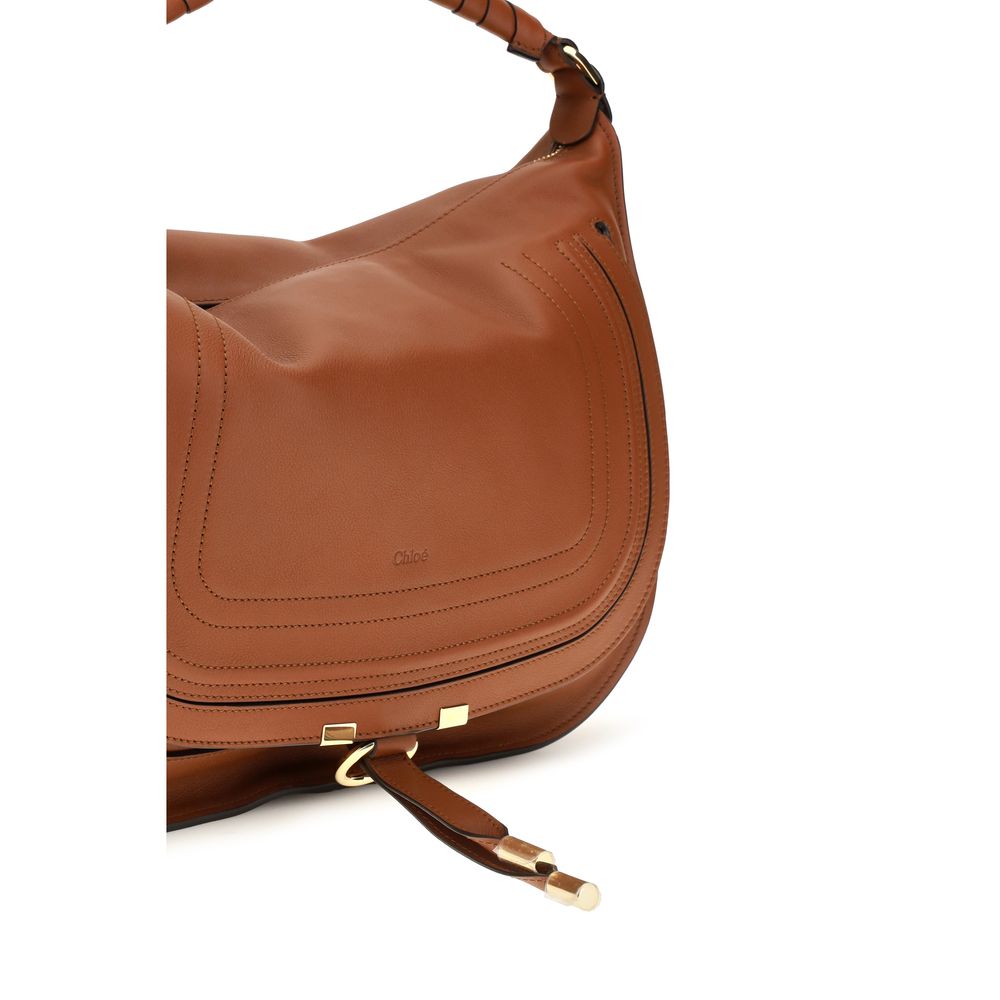 Large Shoulder Flap Bag by Chloé for women in bos taurus calfskin leather brown features a enviable silhouette, showcasing a secure flap & zipper, ample external-pockets, and enviable shoulder-strap for a enviable finish.