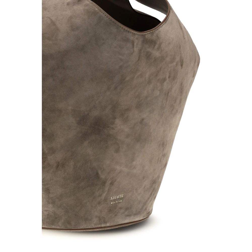 Small Shoulder Bag by Khaite for women in bos taurus calf suede leather beige & monogram features a distinguished silhouette, showcasing a secure and distinguished with versatile shoulder-strap & handle for a distinguished finish.