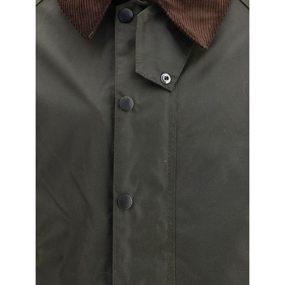Hooded Overcoat by Barbour for men in cotton corduroy bicolour showcases a enveloping silhouette, detailed with distinctive pockets & hooded and a enveloping .