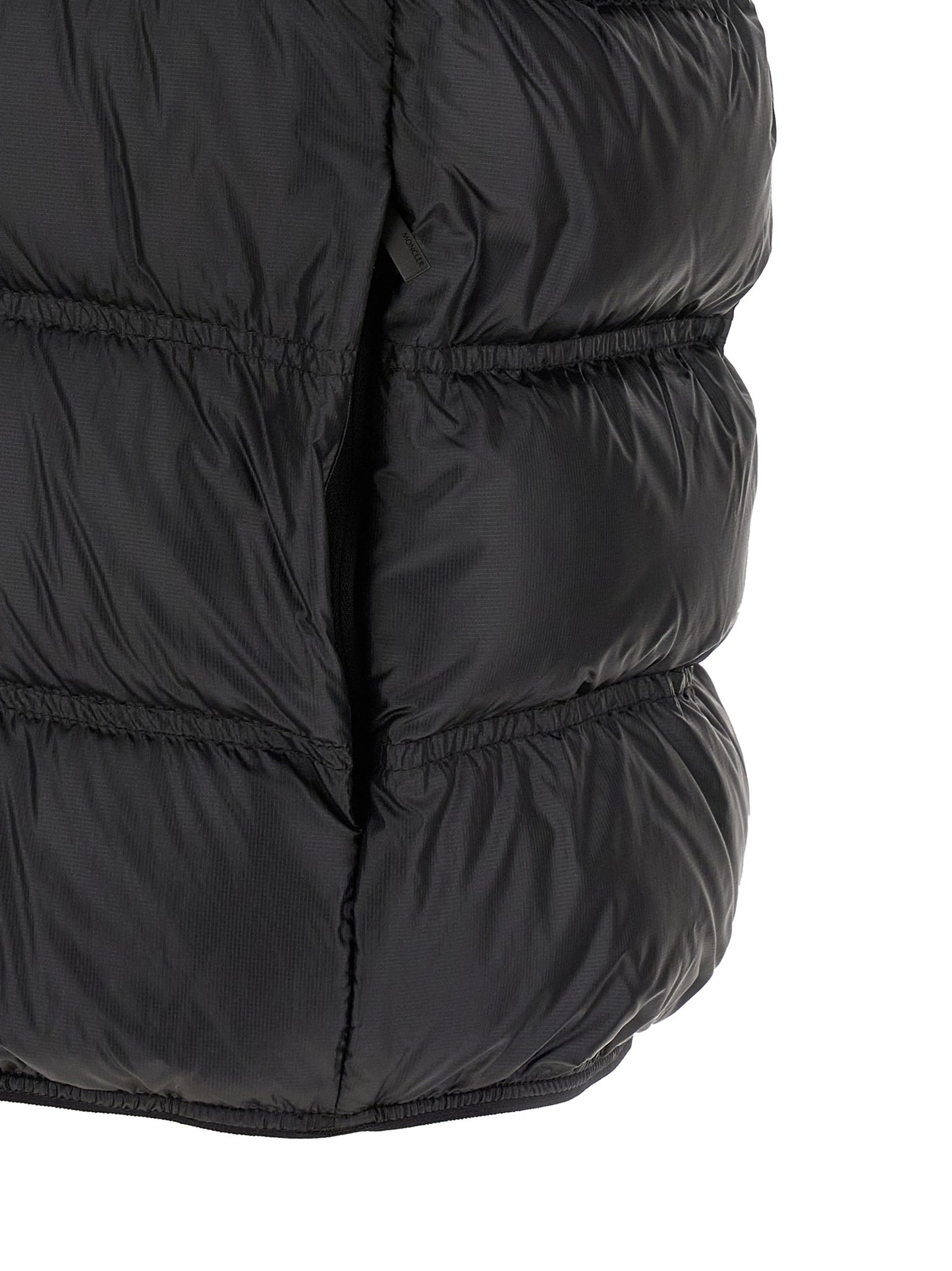 Hooded Vest by Moncler for men in polyamide black showcases a dynamic silhouette, perfectly balancing hooded with a dynamic hooded neckline for a sophisticated, high-fashion look.