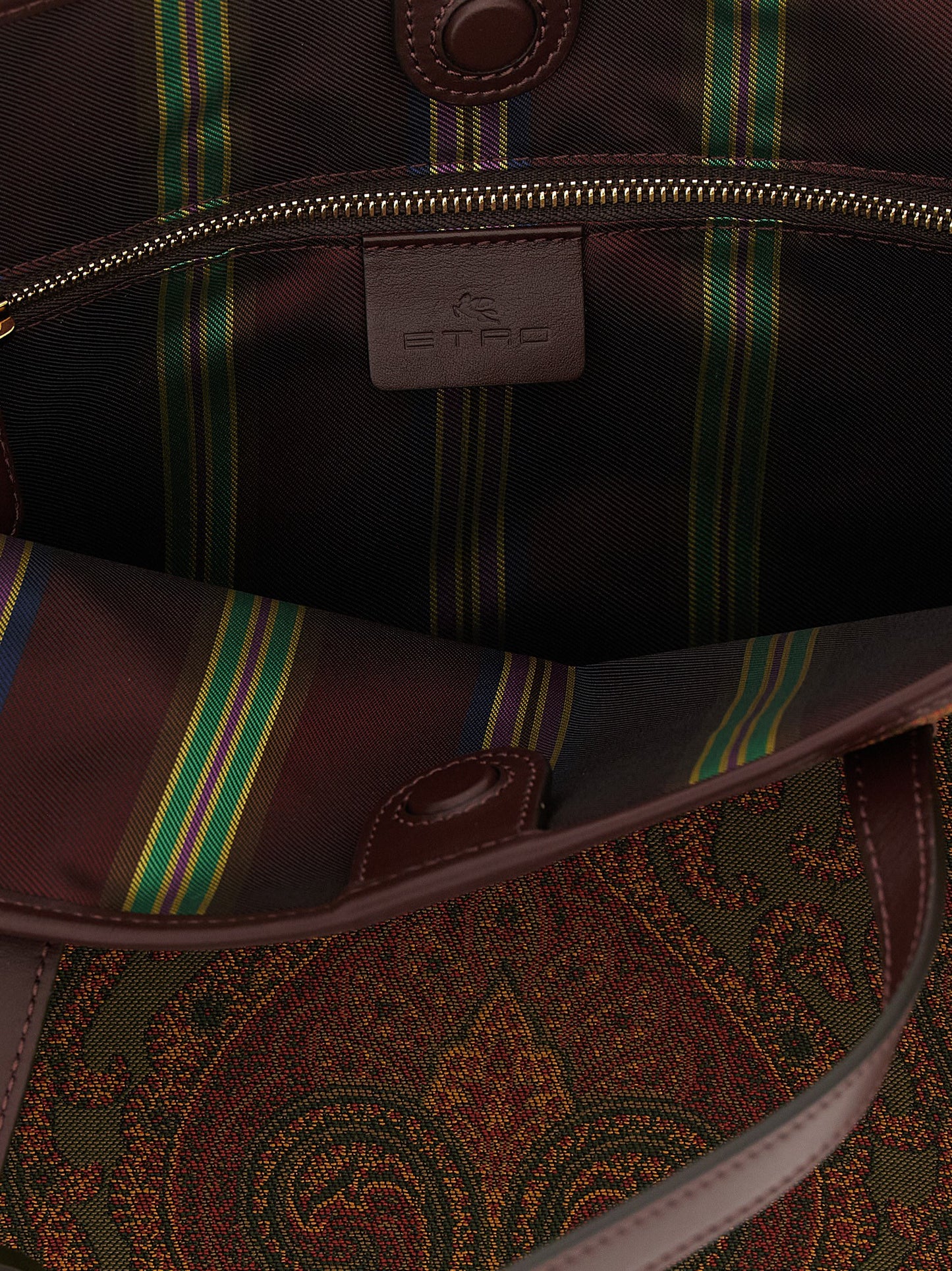 This Large Shopper Tote Bag by Etro for women in polyester leather multicolor, paisley, jacquard & striped features an on trend Pegaso Polyester Leather Large Shopper Tote Bag design with a secure zipper & magnetic, ample , and on trend handle.