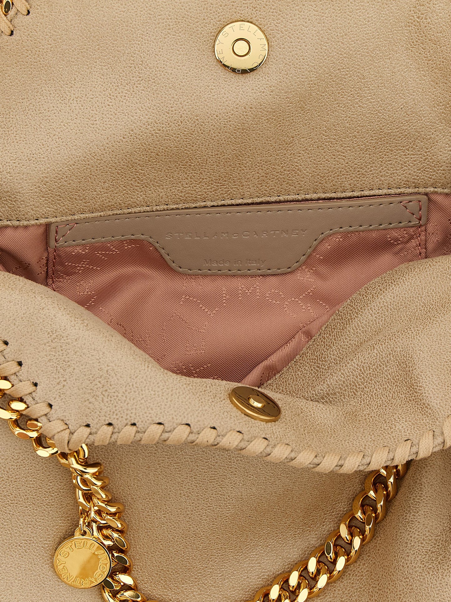 Mini Shoulder Bag by Stella McCartney for women in polyester leather beige & signature features an effortlessly chic silhouette with a secure , ample , and versatile shoulder-strap & handle for effortlessly chic everyday luxury.