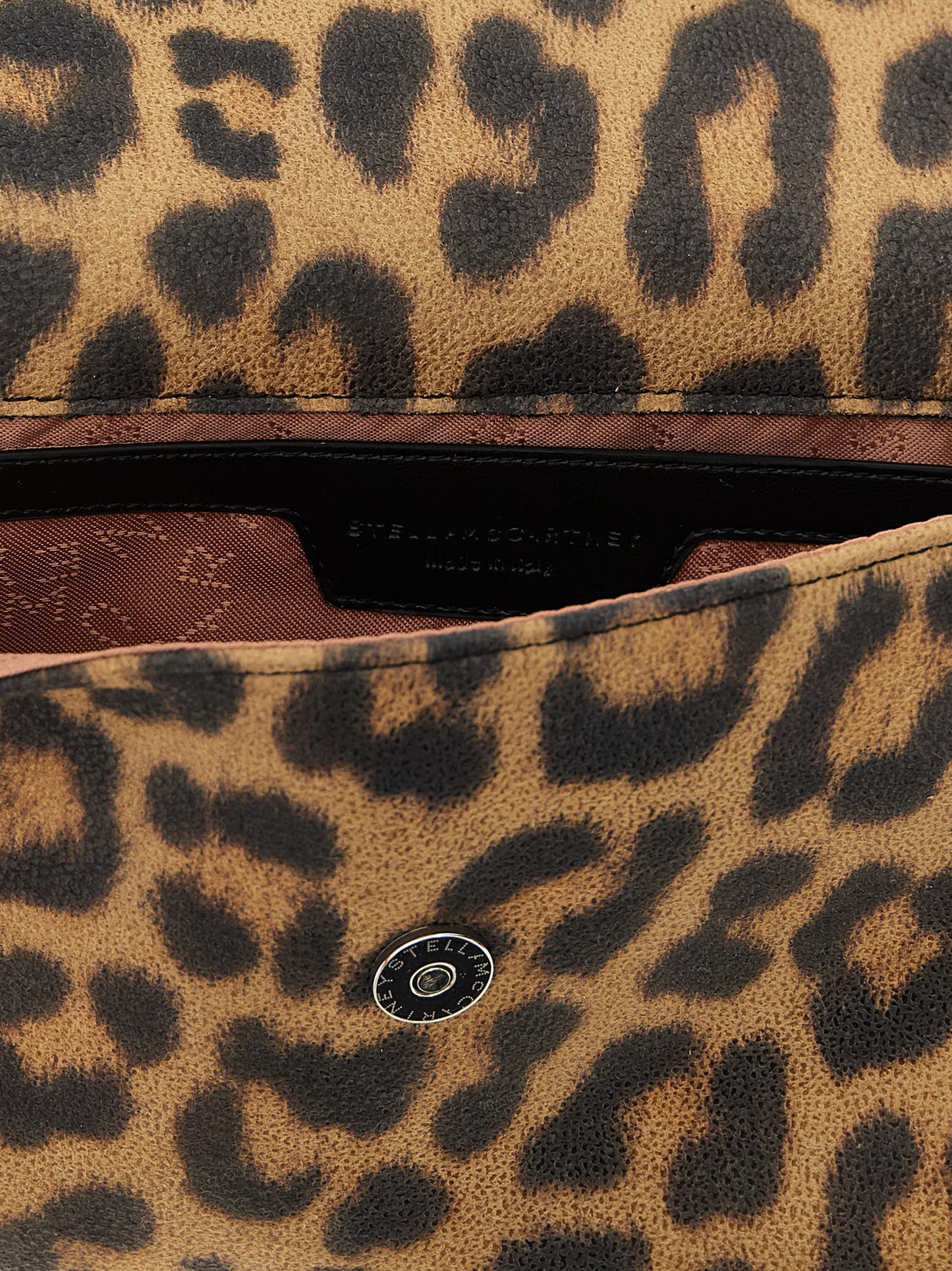 Clutch Handbag by Stella McCartney for women in polyester brown features a architectural silhouette, showcasing a secure magnetic, ample , and versatile for a architectural finish.
