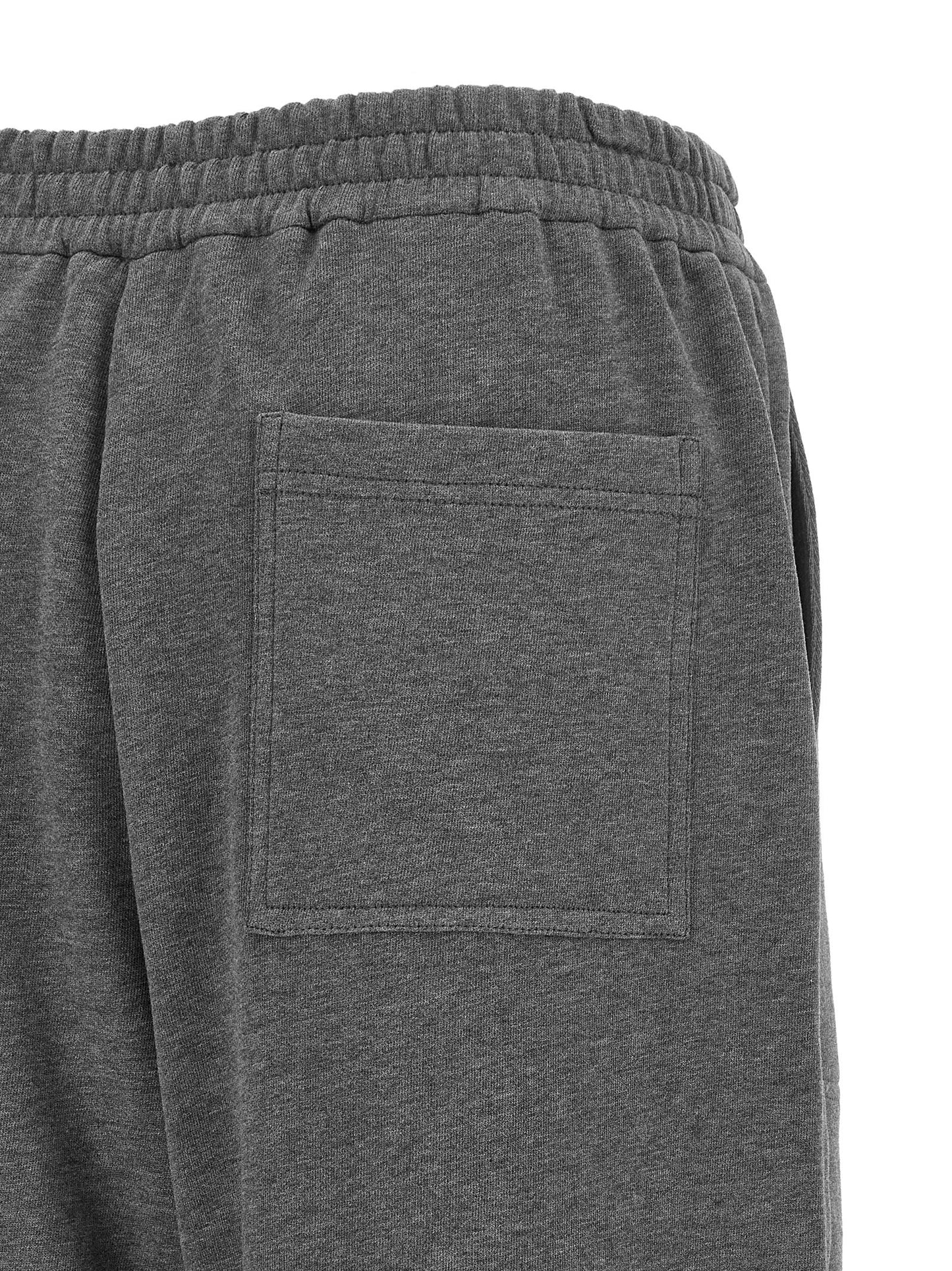 Joggers by Brunello Cucinelli for women in cotton dark-gray & natural features a refined silhouette with a refined wide, defined by a and a refined long for a refined finish.