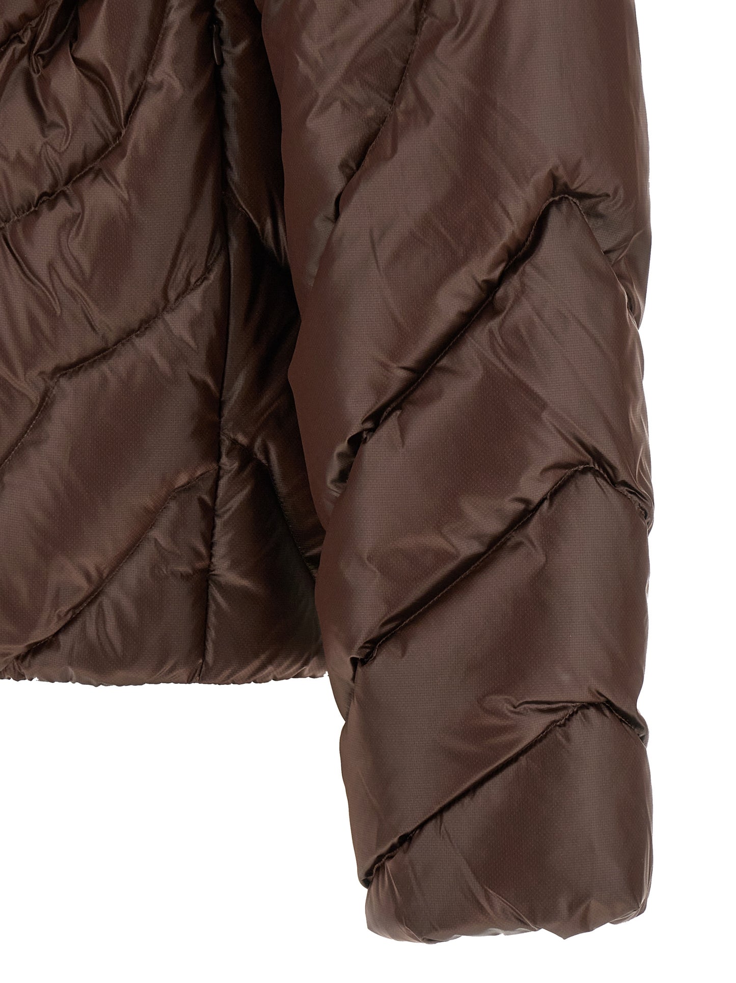 This Hooded Puffer Jacket by Casablanca for men in polyamide brown, gold, herringbone & monogram exhibits a edgy silhouette, meticulously detailed with functional hooded & insulated and a edgy for a edgy finish.