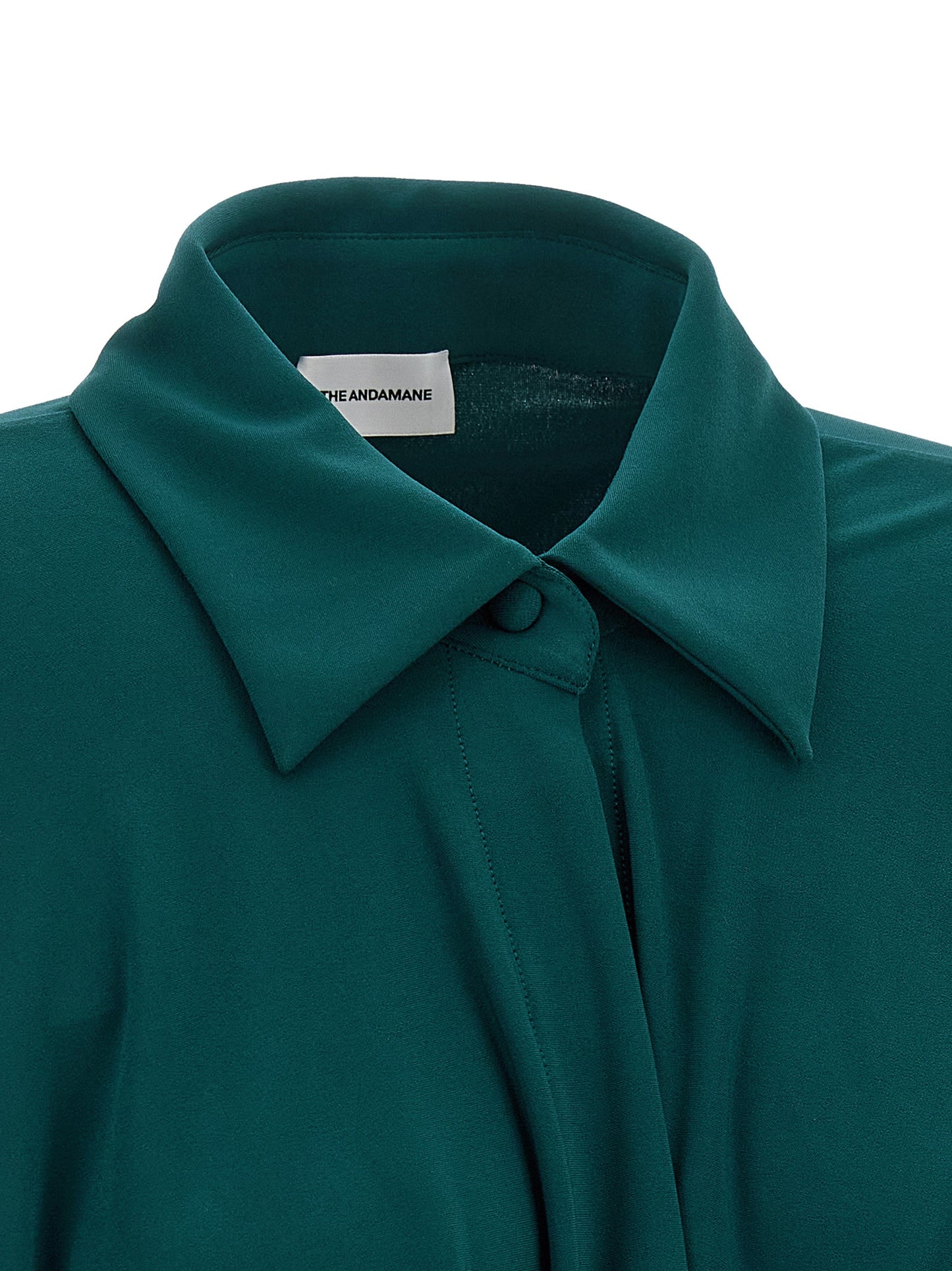 Dress by The Andamane for women in polyester bicolour & green features an magnificent silhouette, artfully detailed with a magnificent and that flows into an magnificent short mini.