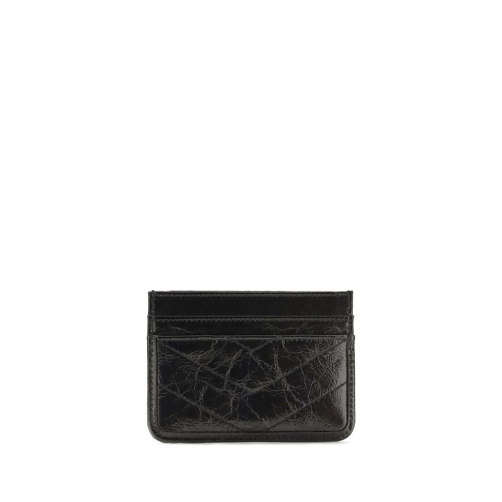 Quilted Shoulder Bag by Saint Laurent for women in bos taurus calfskin leather black, bronze & signature showcases a enviable silhouette, artfully detailed with a secure , organized cardholder, and versatile shoulder-strap for a enviable look.