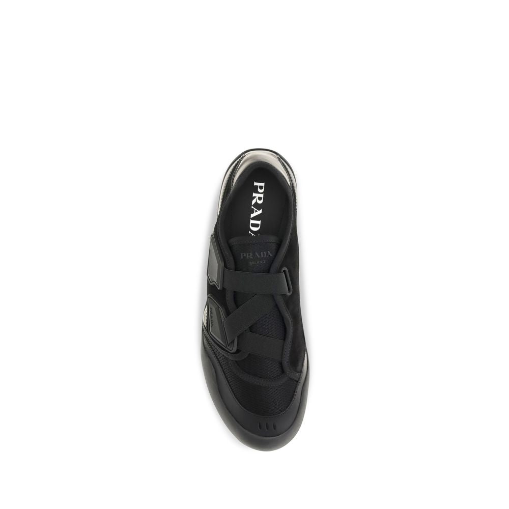 Sneakers by Prada for men in cotton & nylon black presents a sumptuous silhouette, artfully capturing the essence of the Men's Low Top Cotton & Nylon Sneakers with its sumptuous low-top style design.