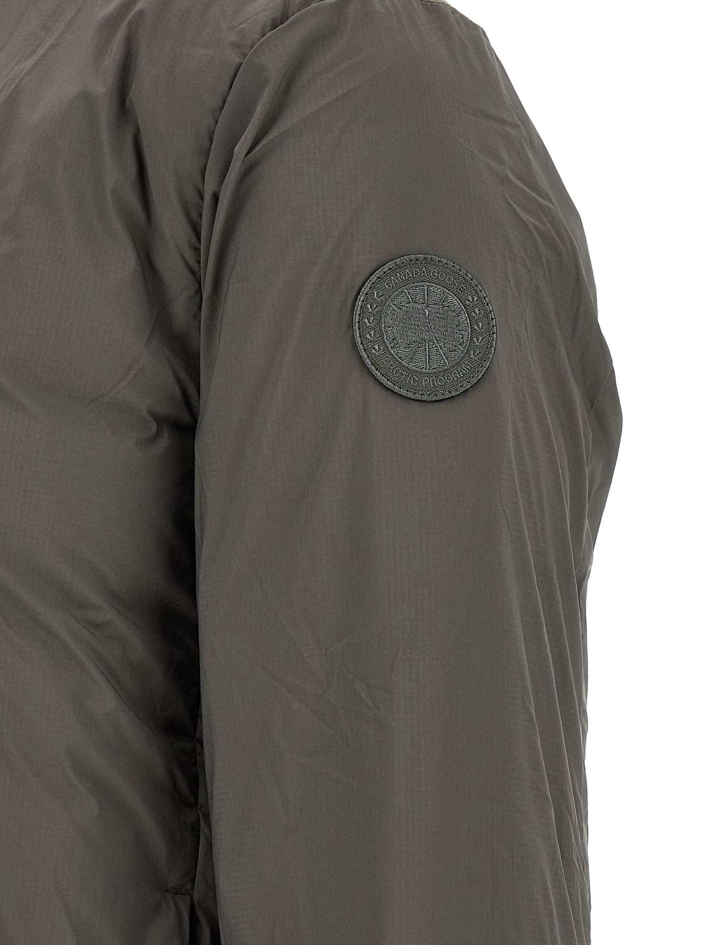 Overcoat by Canada Goose for men in polyamide bicolour, green & olive presents a luxurious silhouette, showcasing a luxurious and sophisticated thermal, pockets & insulated for a premium, luxurious look.