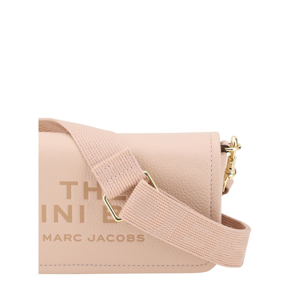 Mini Shoulder Flap Bag by Marc Jacobs for women in bos taurus calf grained leather multicolor & monogram features a enviable silhouette, showcasing a secure flap, magnetic & button, ample single-compartment, and enviable shoulder-strap & adjustable-strap for a enviable finish.
